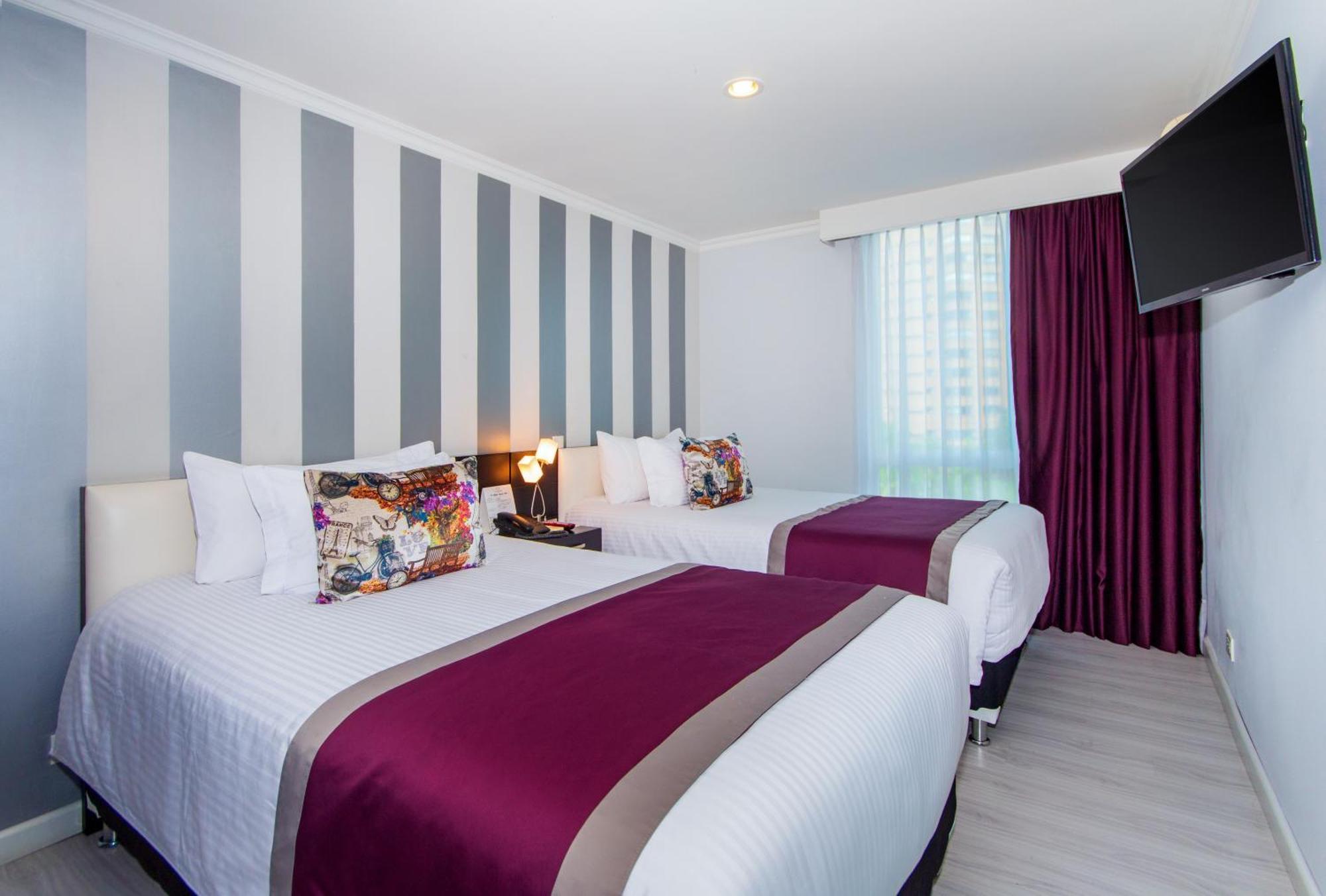 The Morgana Poblado Suites Hotel Medellín Habitación foto